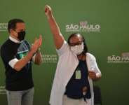 Monica Calazans, a 54-year-old nurse in Sao Paulo became the first person in Brazil to receive the Chinese CoronaVac jab after two vaccines were approved.  By NELSON ALMEIDA (AFP)
