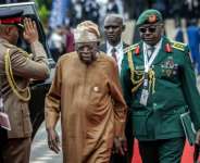Nigerian President Bola Tinubu (C) announced more than 13,000 terrorists had been killed in the past year.  By Luis TATO (AFP/File)