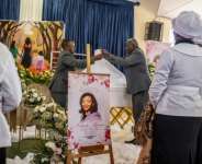 Nothabo Zandile Tshuma and her two daughters were killed in Britain in early July.  By Zinyange Auntony (AFP)