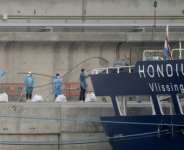 Passengers were taken off the MV Hondius in Tenerife.  By JORGE GUERRERO (AFP)
