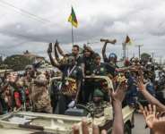 Players from Cameroons victorious WAFCON team wave to the crowds in Yaounde.  By Daniel BELOUMOU OLOMO (AFP)