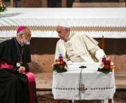 Pope Francis speaks with the Cardinal Cristobal Lopez Romero (left) during his papal visit to Morocco in 2019.  By FADEL SENNA (AFP/File)