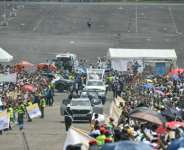 Pope Leo XIV (C) heads to the port city of Douala for a huge open-air mass on the third day of his Cameroon tour.  By Alberto PIZZOLI (AFP)