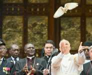 Pope Leo XIV releases a white dove after calling for peace in Cameroon.  By Alberto PIZZOLI (AFP)