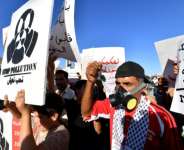 Protesters call for the closure of facilities at an ageing chemical factory in the Tunisian city of Gabes.  By FETHI BELAID (AFP)