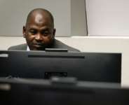 Said is facing seven counts at the ICC. By Peter Dejong (POOL/AFP)