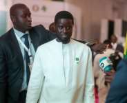 Senegal President Bassirou Diomaye Faye, seen in July 2024, unveiled his new Kiiraay party in Dakar.  By Kola Sulaimon (AFP)