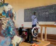 Sewing instructor Yonaba understands the trauma that still haunts his ex-child soldiers pupils.  By Mariam KONE (AFP)