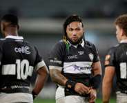 Sharks substitute Maa Nonu (C) speaks to teammates during a break in the match against New Zealand..  By PHILL MAGAKOE (AFP)