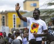 Sifuna drew roars of approval as he greeted supporters during a campaign rally in capital Nairobi.  By SIMON MAINA (AFP)