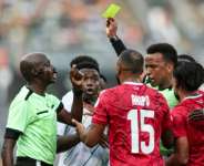 Somali referee Omar Artan (R) received the full support of Somalias Ministry of Sport after he was barred from entering the US.  By FRANCK FIFE (AFP)