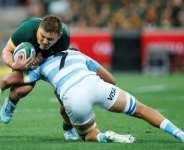 South Africa number 8 Jasper Wiese (L) in action againt Argentina in Mbombela last season.  By PHILL MAGAKOE (AFP)