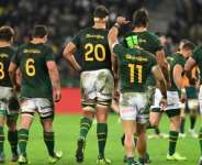 South Africa wing Cheslin Kolbe (3rd R) gives the thumbs up after the Boks beat Australia 30-22 in Cape Town.  By RODGER BOSCH (AFP)