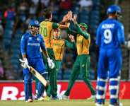 South Africas Marco Jansen (left) celebrates after having Afghanistans Nangeyalia Kharote out caught behind in their World Cup semi-final.  By Chandan Khanna (AFP)
