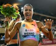 Switzerlands Audrey Werro celebrates after winning the womens 800m at the Lausanne Diamond League. By Fabrice COFFRINI (AFP)