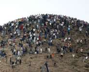 The sudden massive influx sparked an international crisis. By Abdel Majid BZIOUAT (AFP)