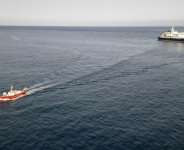 Two crew members and one other person thought to be infected were taken off the ship.  By - (AFP)