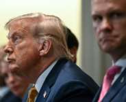 US President Donald Trump released seven more letters setting out tariff rates between 20 percent and 30 percent for trading partners.  By ANDREW CABALLERO-REYNOLDS (AFP/File)
