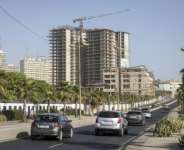 Vehicles drive along the Corniche in Dakar, Senegal, whose new loan with the IMF totals $2.2 billion.  By PATRICK MEINHARDT (AFP/File)