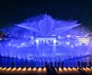 Visitors watch a water and light display during a media preview day for the 2025 Osaka Expo in Osaka on April 9, 2025.  By Richard A. Brooks (AFP)