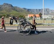 Yuji Gump Suzukis rickshaw weighs more than 100 kilograms (220 pounds).  By RODGER BOSCH (AFP)