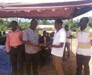 Eric Monarch handing over keys of the facility to Hon Sammy Ewoade