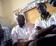 Eng Omar Kalinge Nnyago(Middle)his son Ahmed on his right and the party Chairman Kibirige Mayanja on left