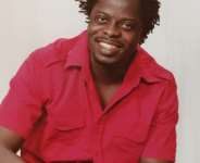 Why is Ghanaian music failing to reach international status as opposed to its Nigerian counterpart?