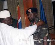 Better Days: President Yahya Jammeh decorates his former ally Lt. General Tamba