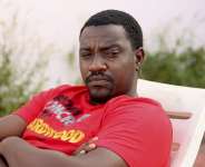 JOHN DUMELO