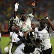 Ghanas players carry their head coach Sellas Tetteh (C) as they celebrate winning the FIFA U-20 World Cup in Cairo on October 16, 2009. Ghana overcame Brazil 4-3 on penalties in the final match, becoming the first African side to win the tournament. AFP PHOTO/KHALED DESOUKI (Photo credit should read KHALED DESOUKI/AFP via Getty Images)