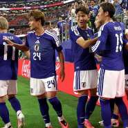 Keito Nakamura #13 of Japan celebrates with teammates after scoring the teams first goal during the FIFA World Cup 2026 Group F match between Netherlands and Japan at Dallas Stadium on June 14, 2026 in Arlington, Texas. - Charlotte Wilson, Getty Images via AFP