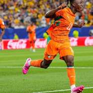 Ivory Coasts Yan Diomande celebrates after teammate Amad Diallo scored their first goal during the World Cup Group E soccer match between Ivory Coast and Ecuador in Philadelphia on June 14, 2026. - Petr David Josek, AP