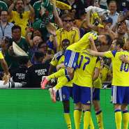 Swedens Viktor Gykeres celebrates scoring their third goal with teammates. - Daniel Becerril, Reuters