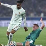 Frances forward #11 Michael Olise (L) and Northern Irelands midfielder #16 Alistair McCann fight for the ball during the international friendly football match between France and North Ireland at the Decathlon Arena - Pierre Mauroy stadium in Villeneuve-dAscq, northern France ahead of the 2026 FIFA World Cup football tournament, on 8 June 2026. - AFP - FRANCK FIFE