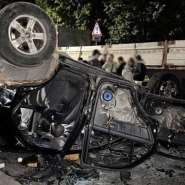 This handout photograph published on July 9, 2026 shows an overturned Ukrainian army conscription vehicle in Lviv following unrest that erupted after officers detained a man suspected of evading military service and took him to a draft centre on July 8, 2026. -  Ukrainian Prosecutor Generals office via AFP