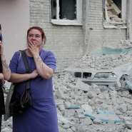 Kyiv residents examine the destruction from a Russian missile strike on an apartment building on July 2, 2026. -  Efrem Lukatsky, AP