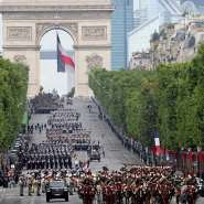 File photo: Frances President and the Chief of the Defence Staff General review troops during the annual Bastille Day military parade with on the Champs-Elysees Avenue in Paris on July 14, 2025. -  Ludovic Marin, AFP