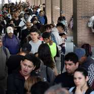 Streams of men, women and children have queued in the streets to obtain documents and attend appointments for their regularisation. -  Thomas Coex, AFP