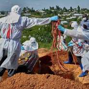 Red Cross workers lower the coffin of Dr. Tibenderana Katho Blaise who worked at the Centre Medical Evangelique (CME) in Hoho commune and died of Ebola virus, in Bunia town, Ituri province, Democratic Republic of Congo, 26 May 2026. -  Gradel Muyisa Mumbere, Reuters