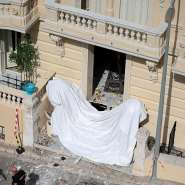 Members of a bomb disposal team operate the day after an attack involving an explosive device in the lobby of a residential building, in Monaco on 30 June 2026. -  Valry Hache, AFP