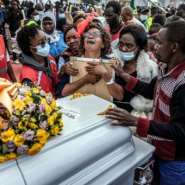 Relatives mourn at a memorial for victims of the Utumishi Girls Academy fire, the latest in a wave of such tragedies across Kenya.  By Luis TATO (AFP)