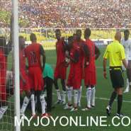 Sudan players attending to their injured goal keeper in the match against Ghana