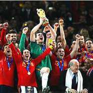 Casillas and his team mates lift aloft the World Cup in wild jubilation