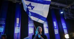 A supporter of former military chief Gadi Eisenkot, leader of the Yashar party, in Tel Aviv, Israel, October 27, 2026 -  Shir Torem, Reuters