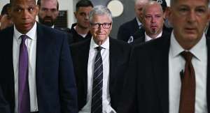 Microsoft co-founder Bill Gates (center) arrives for a closed-door hearing before a US congressional committee regarding the Epstein case, June 10, 2026, Washington -  Kent NISHIMURA, AFP