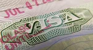 This photo illustration shows a visa stamp on a foreign passport in Los Angeles on June 6, 2020. -  Chris Delmas, AFP file photo