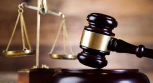 Marketer accused of threatening to kill EOCO staff granted GH¢100,000 bail