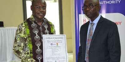 Prof. Dodoo, GSA Director-General Left and Dr Akwasi Achampong, GSA Board Chairman after receiving a certificate of accreditation from Daaks, A German Accreditation Agency