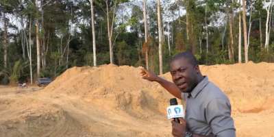 Journalist Akwasi Agyei Annim taking a video of the mining site shortly before the attack. (Photo: Akwasi Agyei Annim)